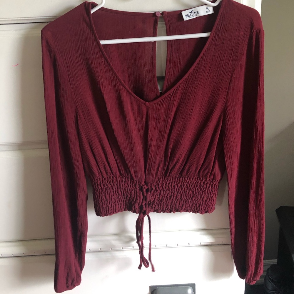 a cute crop top with a unique string bottom
